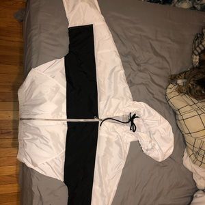 White and black windbreaker